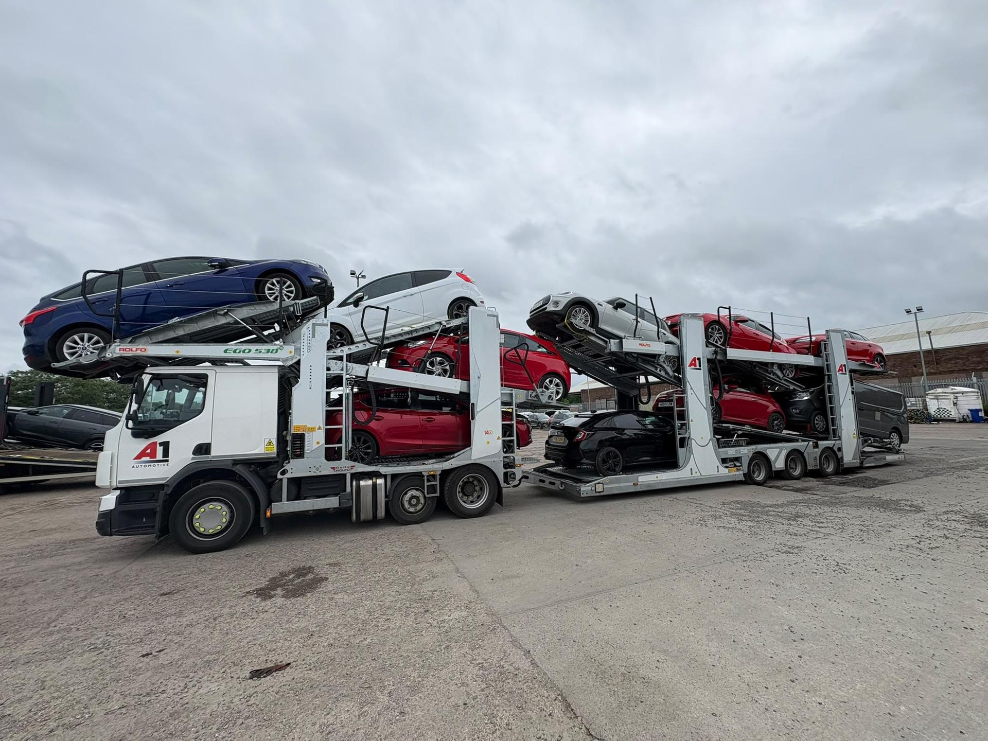 A1 Automotive transporter in current livery, loaded with mixed passenger cars