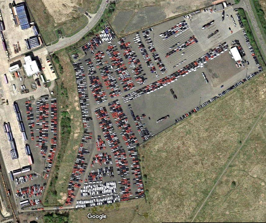 Vehicles stored in rows at the A1 compound
